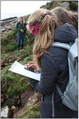 Figure 6: Members of the public using a mobile phone app to record eroding sites as part of SCAPE's new project to update the CZAS data, ©SCAPE.