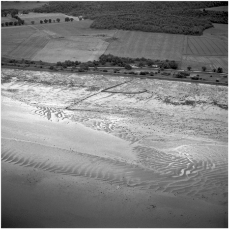 Figure 16: Aerial photograph of a double yair, on the south side of the Beauly Firth, near Inverness. Whether the different forms of trap are indicative of different phase of use, as a result of tidal regime changes or fishing by different methods remains unclear ©RCAHMS SC700317