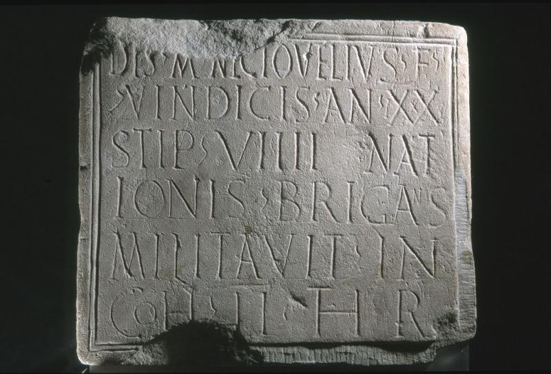 A stone slab carved with a Latin inscription