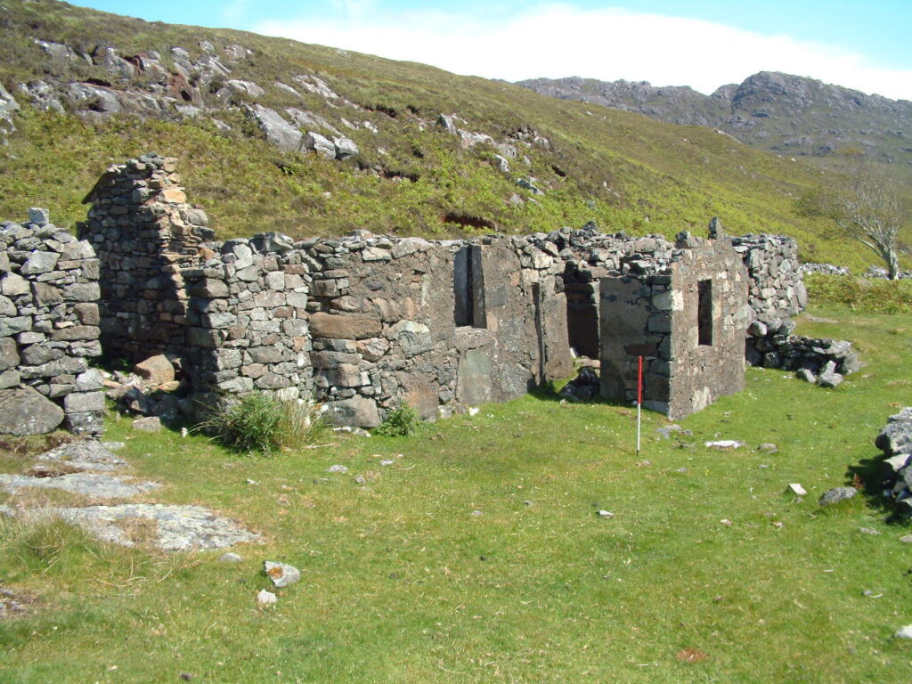 Still standing stone walls of a rectangular structure.