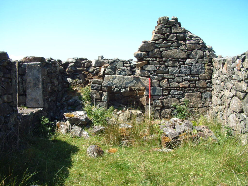 View of the interior of a stone house. 