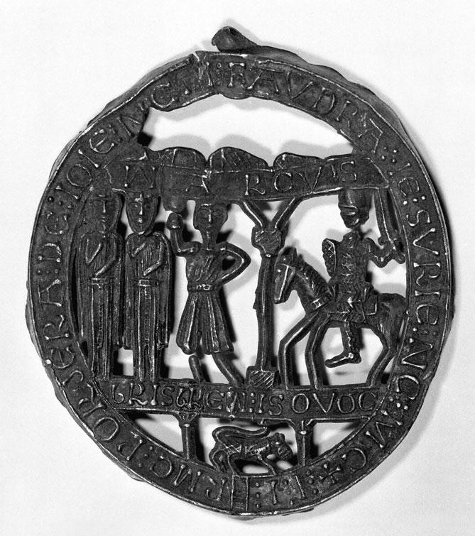 Intricate black metal circle, carved with a wreath of letters and numbers, and with  three people standing and one person on a horse. At the bottom is a small animal on all fours, possibly a dog. 