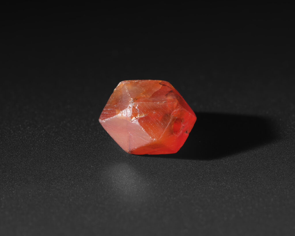 Close-up of a single red bead