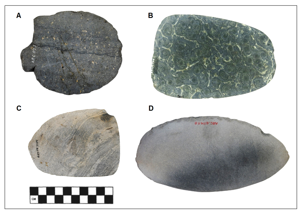 Four round and oblong knives presented in one image. They range in colour from dark grey to green and sand. They are all sub-circular and irregularly shaped and show chips and scrapes from use.