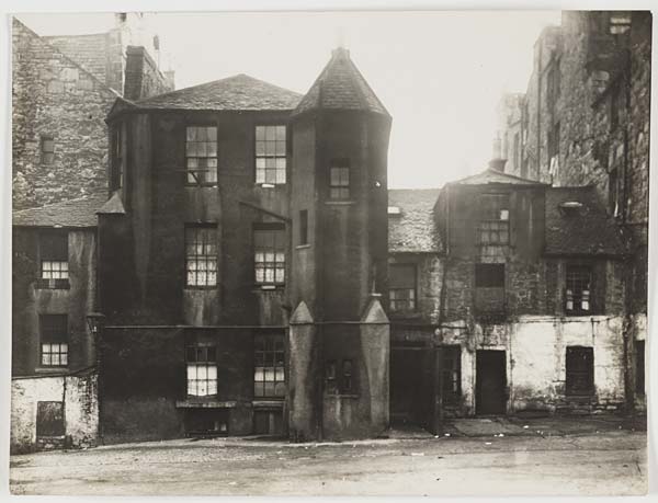 Black and white photo of tenament from the street