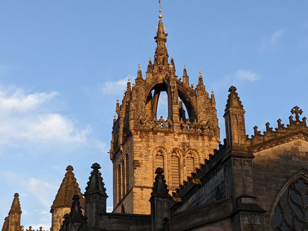 Ornate top of the tower of St Giles church, carved in the shape of a crown
