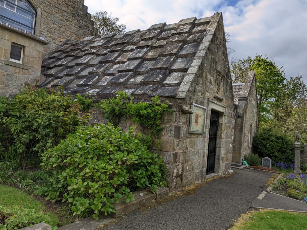 Photograph of small building attached to kirk