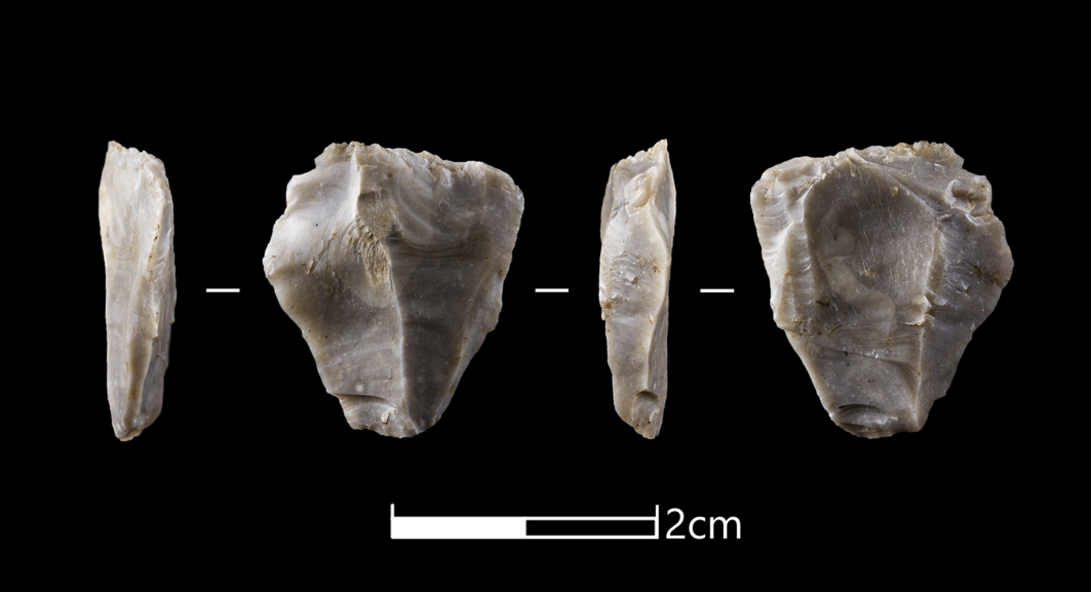 photographs of flint from each side on black background