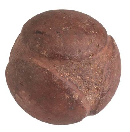 Photography of red / brown carved stone ball against white background