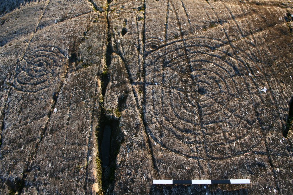 Closeup of concenrtic circular rock carvings